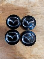 Originele middelgrote doppen van Mazda, Zo goed als nieuw
