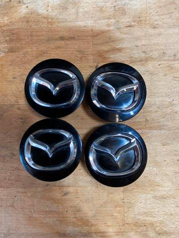 Originele middelgrote doppen van Mazda beschikbaar voor biedingen