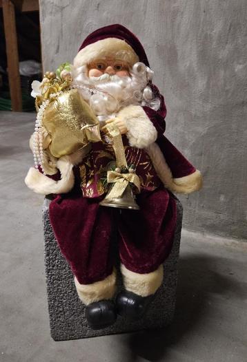 Zittende kerstman beschikbaar voor biedingen