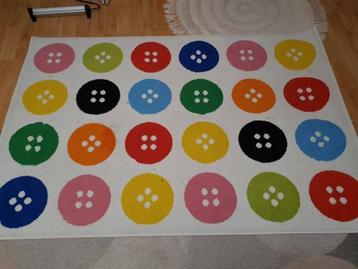 Vrolijk vloerkleed op zoek naar een nieuw huis! beschikbaar voor biedingen