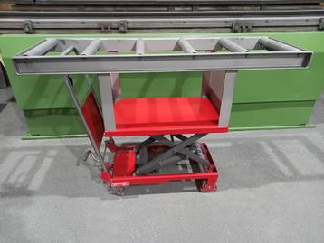 rollenbaan in hoogte verstelbaar - schaarheftafel met rollen beschikbaar voor biedingen