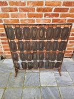 Antiek haardscherm, Enlèvement