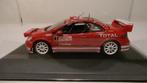 PEUGEOT 307 WRC GRONHOLM M-C 05.IXO 1/43 IMPEC + VITRINE, Ophalen of Verzenden, Zo goed als nieuw, Auto, Overige merken