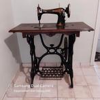 Antieke naaimachine, Ophalen