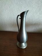 Vase ou cruche en étain, Enlèvement