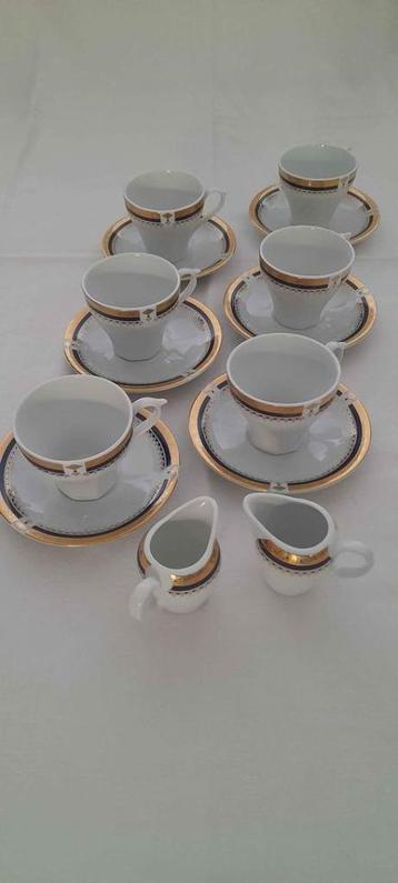 Koffieservies met goud- en blauwe rand