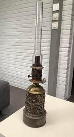 Oude koperen petroleumlamp, Ophalen