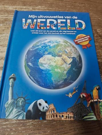 Mijn uitvouw atlas van de wereld beschikbaar voor biedingen