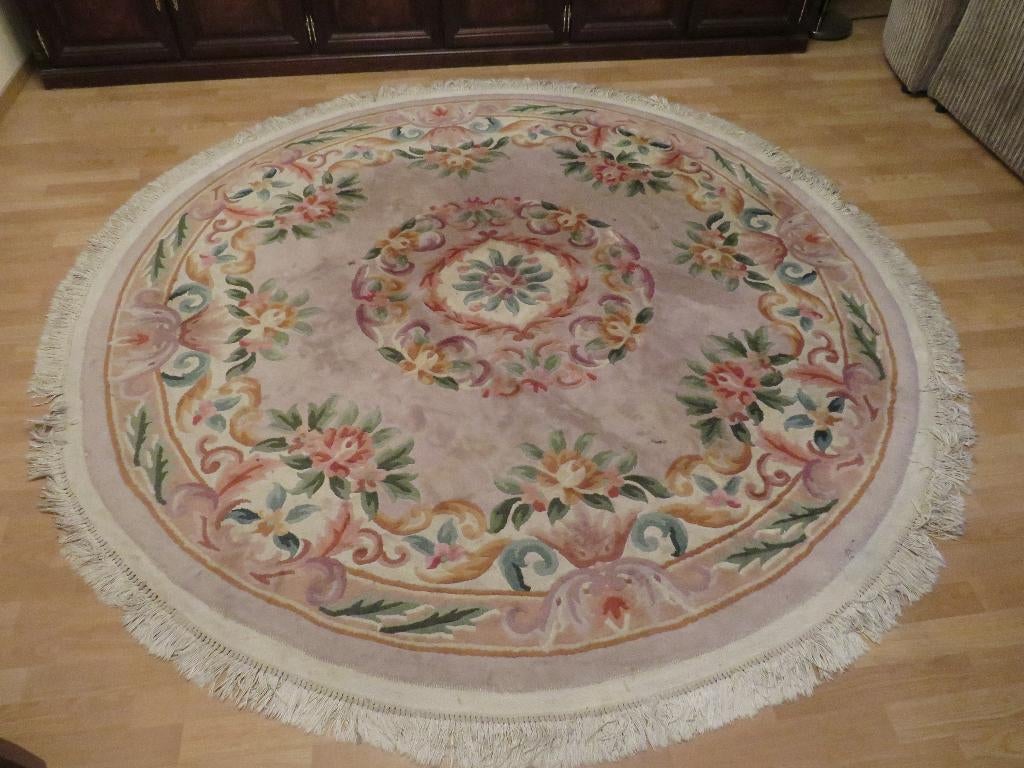 Rond Chinees tapijt, Ophalen, Rond