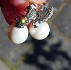 Vieilles boucles d'oreilles chics., Envoi