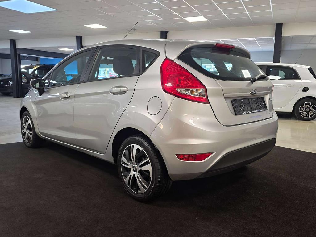 Ford Fiesta 1.25i Ghia - Benzine - Airco (bj 2011), Voorwielaandrijving, Euro 5, Stof, 4 cilinders