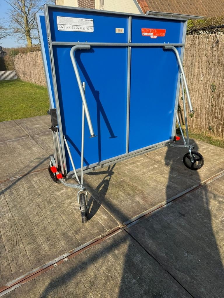 Pingpongtafel met hoes, Ophalen