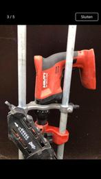 Hilti schroefmachine met beugel, Ophalen