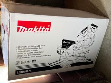 Scie à tronçonner Makita neuve dans sa boîte disponible aux enchères