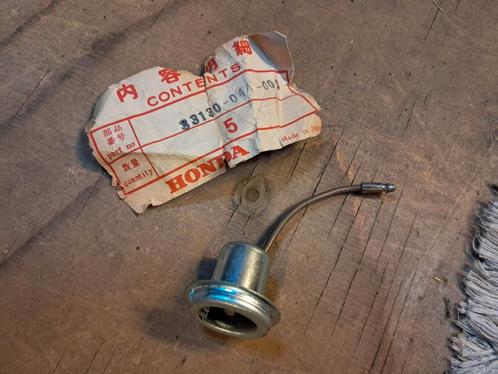 Honda P50 PC50 PS50 koplamfitting NOS, Fietsen en Brommers, Brommeronderdelen | Oldtimers, Ophalen of Verzenden