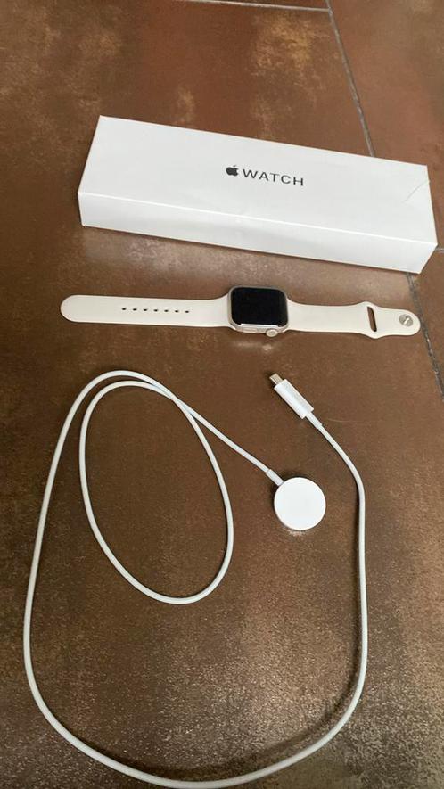 Apple Watch SE 2024 40mm starlight sportband met garantie, Handtassen en Accessoires, Smartwatches, Nieuw, Ophalen of Verzenden