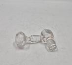 Deux bouchons en cristal, Ophalen