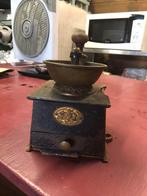 Antieke koffie molen, Ophalen