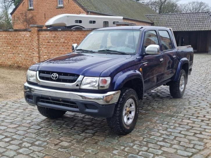 Toyota Hilux 2.5 Turbo D-4D 4WD SR5, Auto's, Toyota, Bedrijf, Te koop, Hilux, 4x4, ABS, Lichtmetalen velgen, Radio, Trekhaak, Diesel