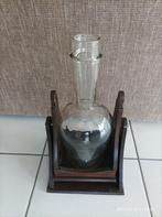 1 grande bouteille sur socle en bois, Ophalen