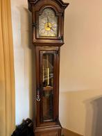 Werkende antieken horloge, Ophalen