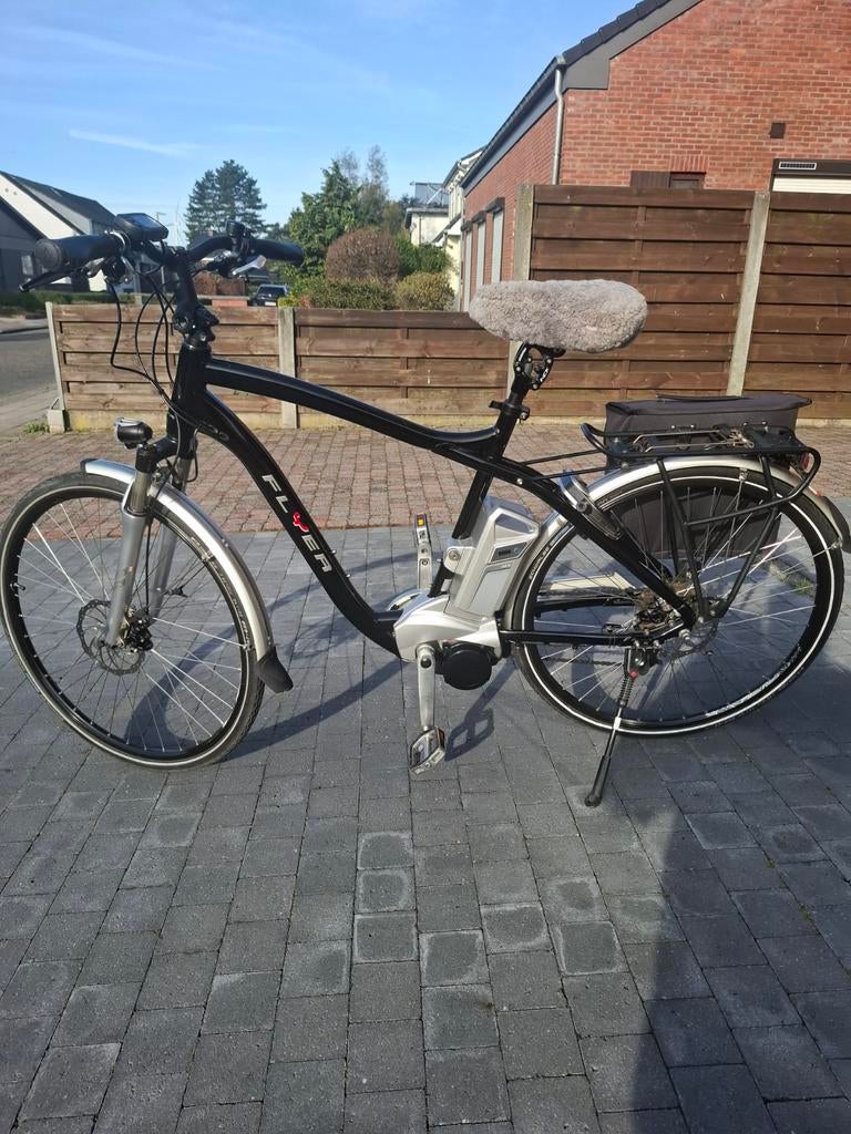 Electrische herenfiets flyer, Ophalen