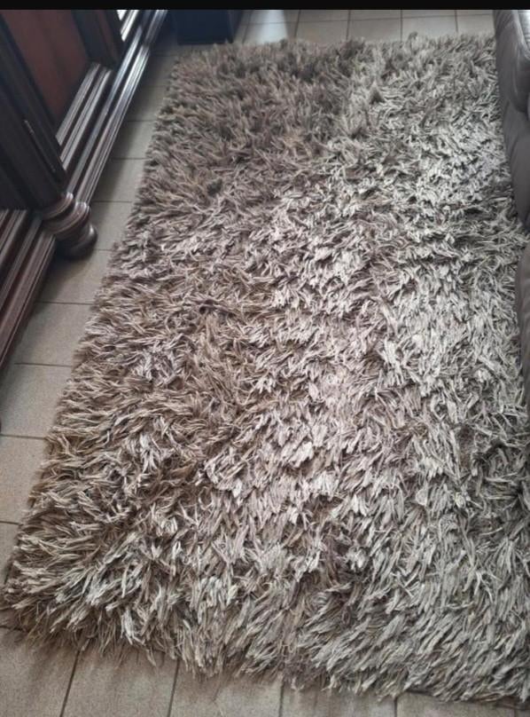 Tapijt grijs, Ophalen