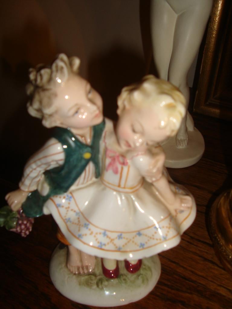 Porselein beeldje., Ophalen