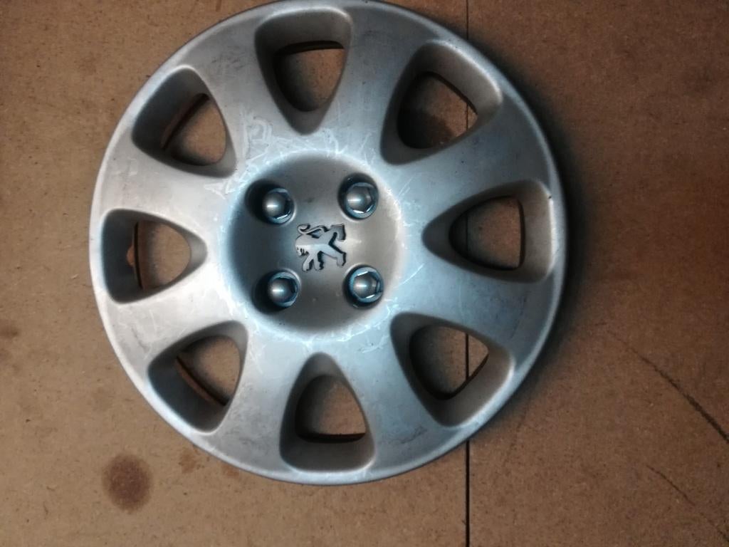 enjoliveur de roue Peugeot en 15 pouces ( 4 pièces ), Autos : Divers, Enjoliveurs, Enlèvement, Comme neuf