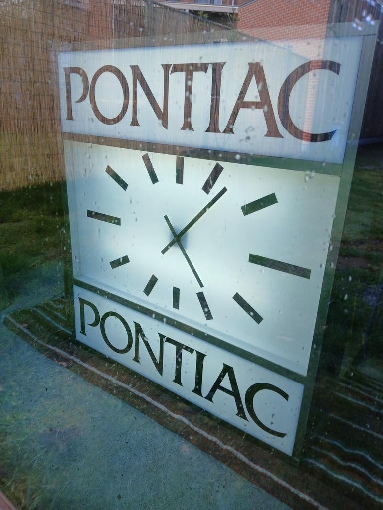 Vintage Pontiac wandklok, Ophalen