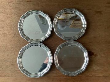 4 roestvrijstalen onderzetters beschikbaar voor biedingen