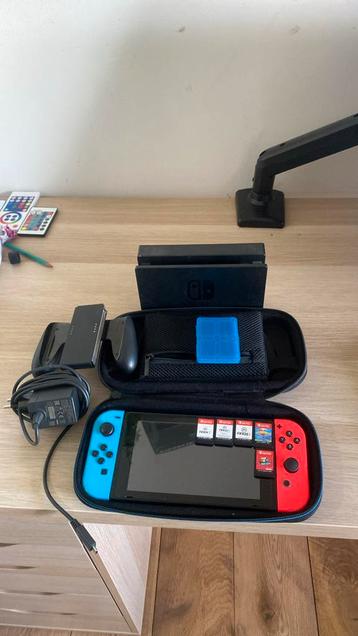 Nintendo switch+spelletjes lader en controller erbij+ fc25 beschikbaar voor biedingen