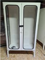 Dubbele vintage apotheekkast, Ophalen