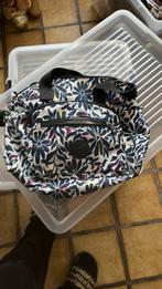 Kipling draagtas, Enlèvement, Comme neuf