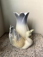 Porseleinen vaas, Ophalen