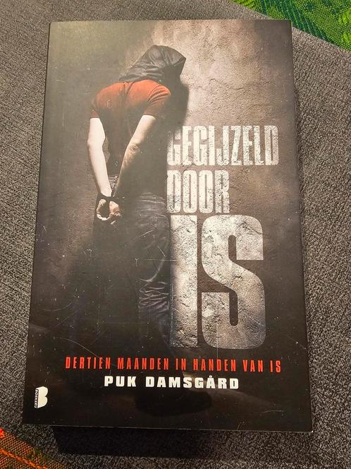 Puk Damsgard - Gegijzeld door IS, Livres, Livres Autre, Comme neuf, Enlèvement ou Envoi