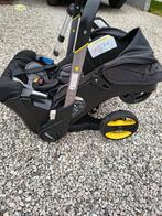 Doona autostoel en buggy 2 in 1, Mode veille, Comme neuf, Enlèvement, Ceinture de sécurité ou Isofix