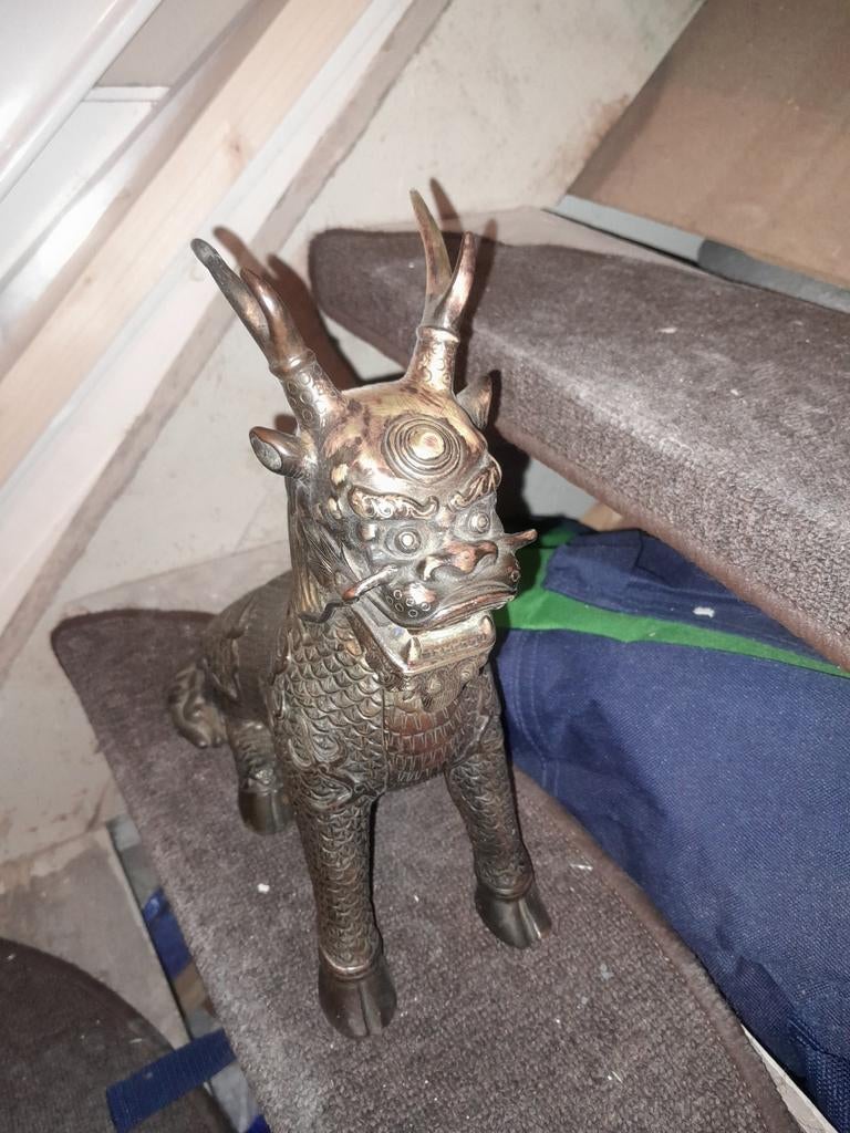 Oude chineze leeuw standbeeld, Ophalen