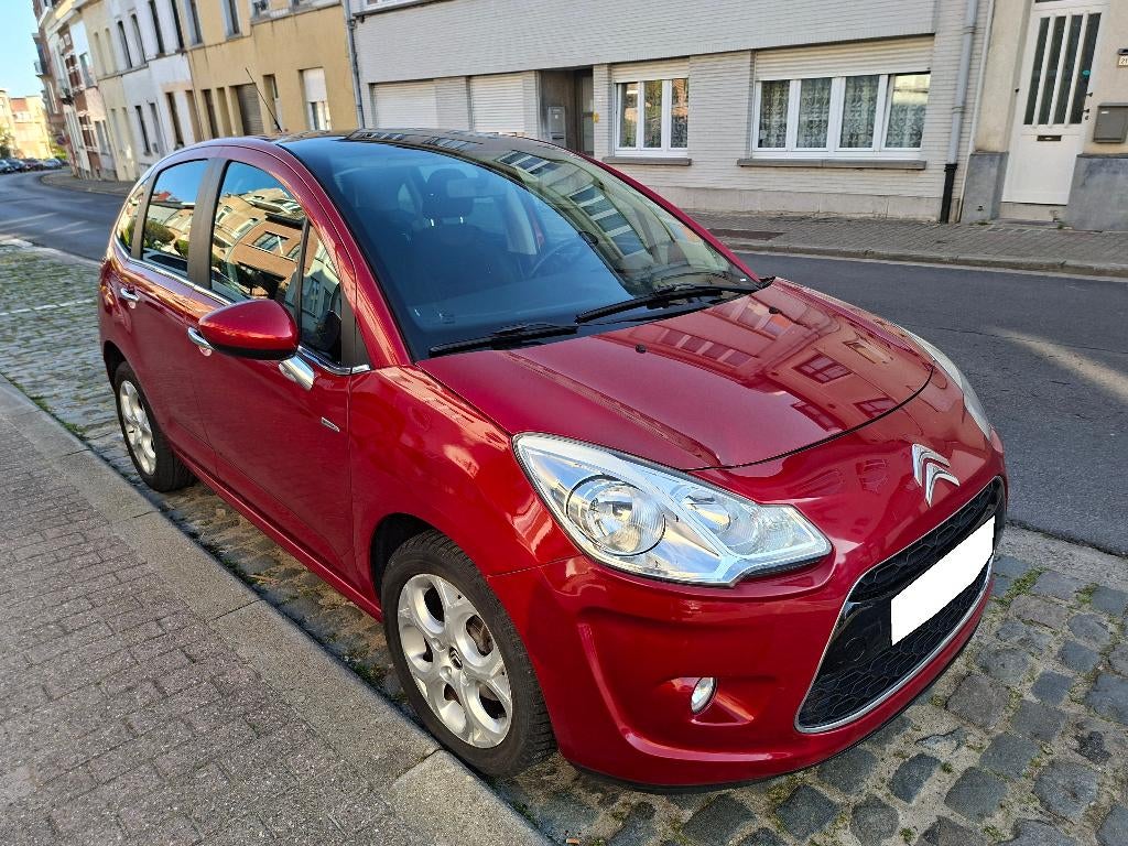 Citroen C3 1.6i AUT. GPS. EXCLUSIVE, Autos, Citroën, Rouge, Euro 5, Airbags, Entretenue par le concessionnaire