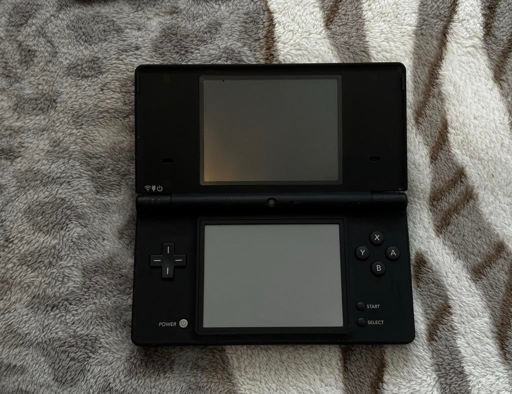 Console Nintendo DSi noire en excellent état., Enlèvement, Comme neuf
