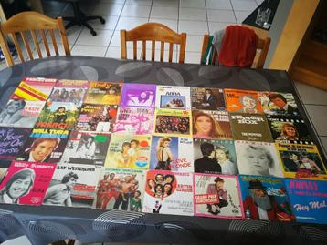 lotje van 56 singles verschillende genres beschikbaar voor biedingen