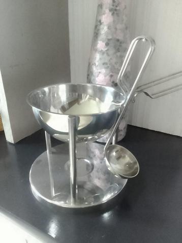 saucière inox vintage, design conçu par Bent Falk en 1991 disponible aux enchères