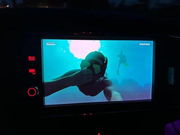 Video in Motion (Video tijdens het rijden) beschikbaar voor biedingen
