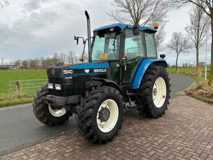 1996 New holland 5640 met voorlader Vierwielaangedreven land, Zakelijke goederen, Landbouw | Tractoren, New Holland, Gebruikt