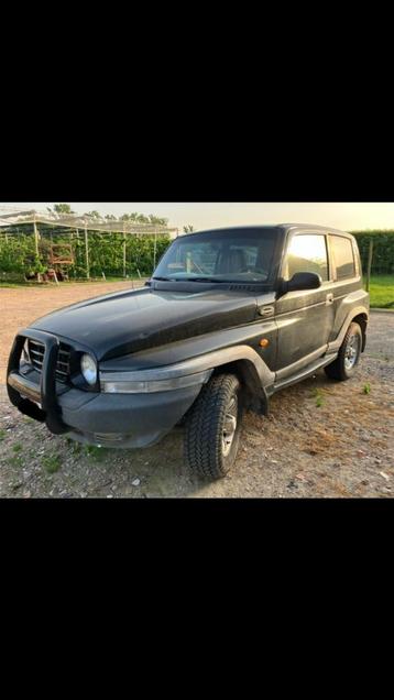 Ssangyong korando, Auto's, Leder en Stof, Zwart, Vierwielaandrijving, Particulier