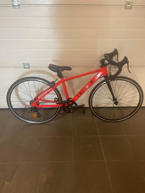 Een fel oranje koersfiets van het merk triban, Fietsen en Brommers, Fietsen | Racefietsen, Zo goed als nieuw, Heren, Overige merken