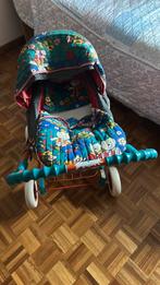Kleurrijke poppenwagen, Ophalen, Gebruikt