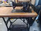 Antieke naaimachine, Ophalen