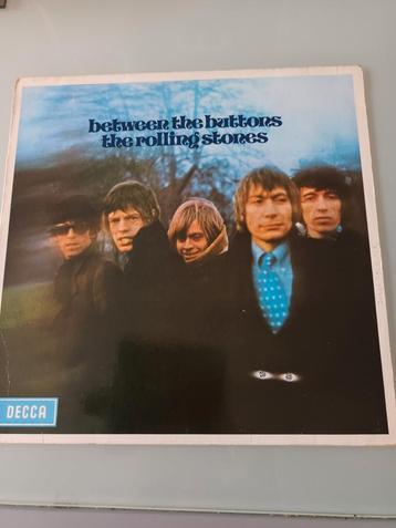 The rolling stones, between the buttons.  beschikbaar voor biedingen