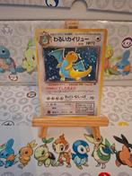 Dragonite holo Rocket Gang, Ophalen of Verzenden, Booster